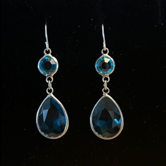 Handcrafted silver tone earrings with a blue colored stones. - Picture 1 of 4